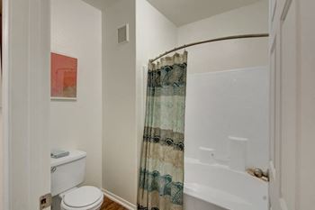 Large Soaking Tub In Master Bathroom With A Tile Surround at Andante Apartments, Phoenix, Arizona